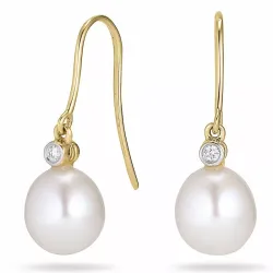 Ovalen 7 - 8 mm süßwasserperle, aaa-qualität diamantohrringe in 14 karat gold mit diamanten