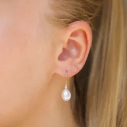 Ovalen 7 - 8 mm süßwasserperle, aaa-qualität diamantohrringe in 14 karat gold mit diamanten 