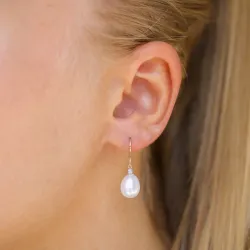 Ovalen 8 - 9 mm süßwasserperle, aaa-qualität diamantohrringe in 14 karat gold mit diamanten