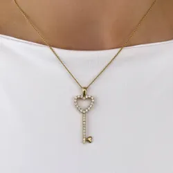 Schlüssel diamantanhänger in 14 karat gold 0,55 ct