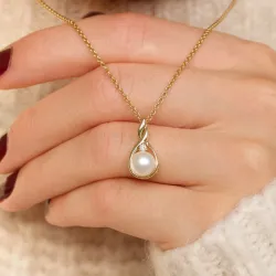 Perle diamantanhänger in 9 karat gold 0,03 ct