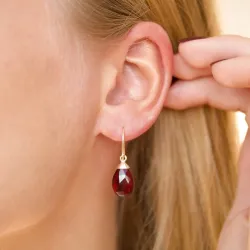 Ohrringe in 9 Karat Gold mit rotem Bergkristall 