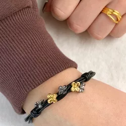 schwarz Armband aus Leder und Blumenanhänger aus vergoldetem und rhodiniertem Silber